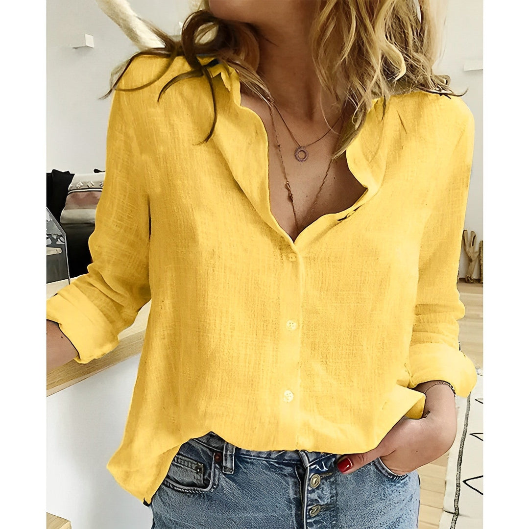 Casual women's relaxed fit button down blouse, easily paired with various outfits.
