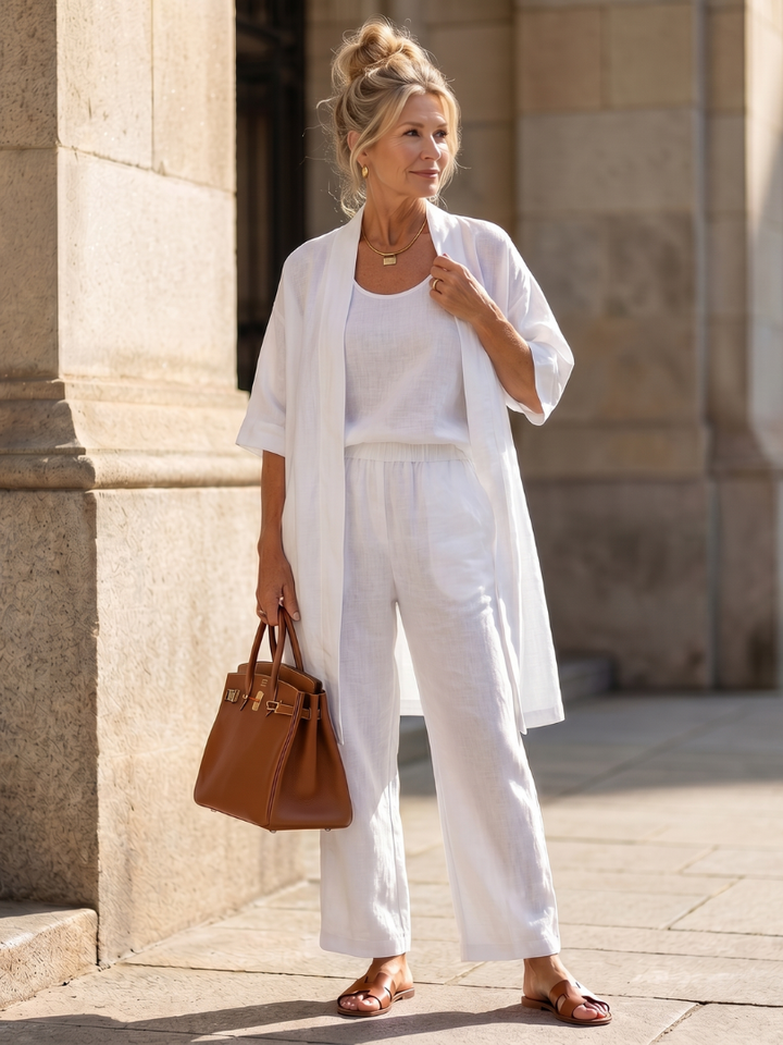 Stylish women's lounge wear, a three-piece relaxed outfit with wide-leg pants for comfort.