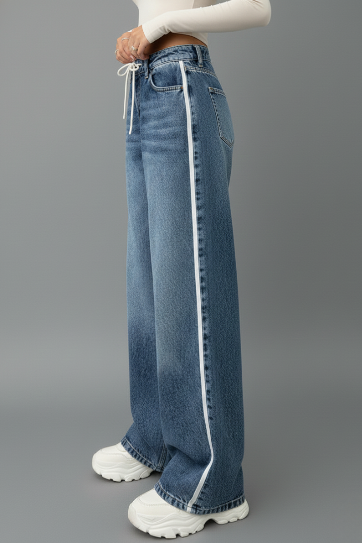 Fashionable women's wide-leg denim jeans, relaxed fit blue wash with practical drawstring