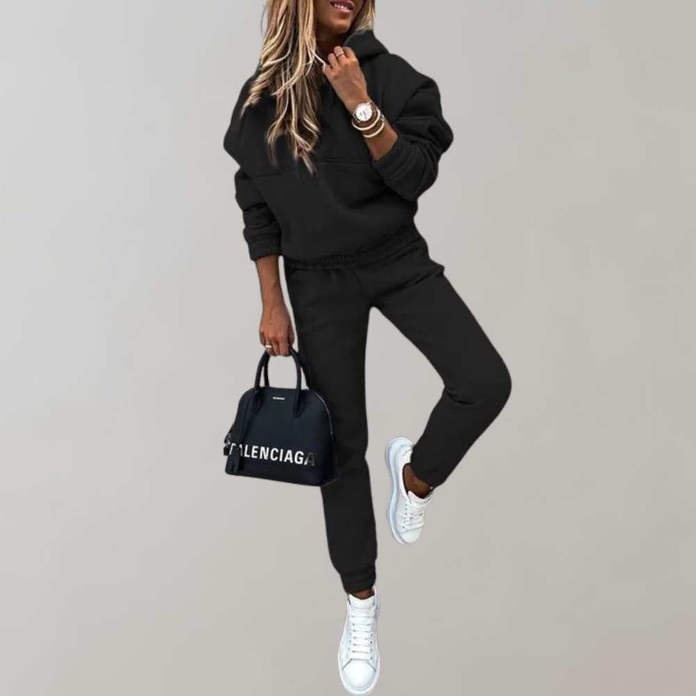 Women's retro style training tracksuit with hood, perfect for casual wear & lounging. Comfortable athletic activewear.