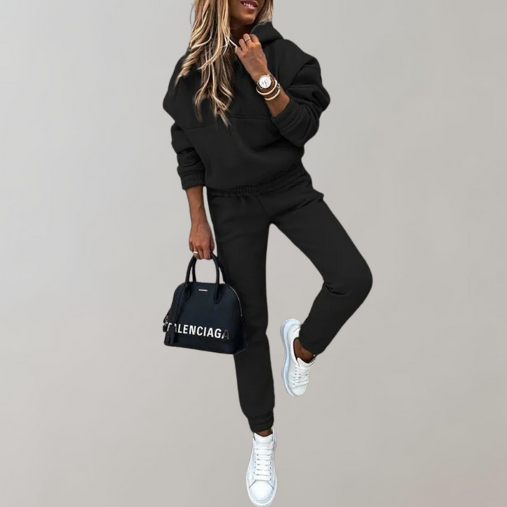Women's retro style training tracksuit with hood, perfect for casual wear & lounging. Comfortable athletic activewear.
