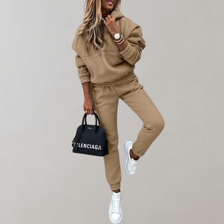 Women's retro style training tracksuit set with hood, long sleeves, perfect for activewear, casual or loungewear.