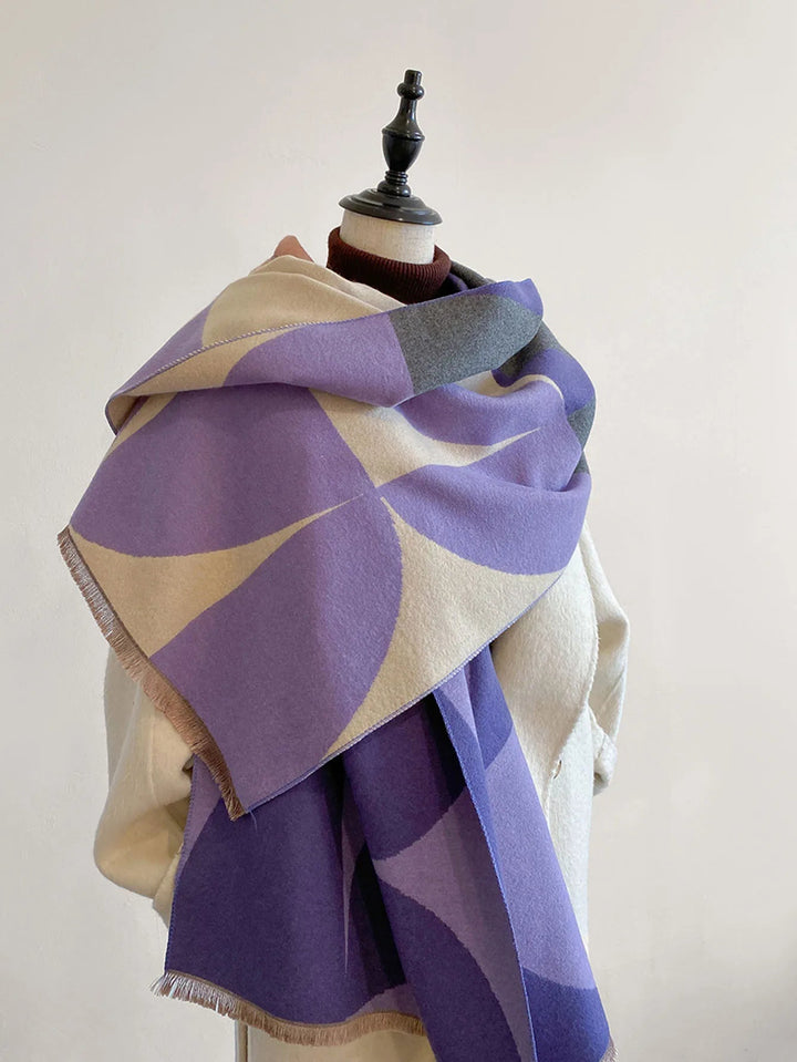Women's reversible cashmere scarf for elegant warmth. Soft, luxurious winter fashion accessory.