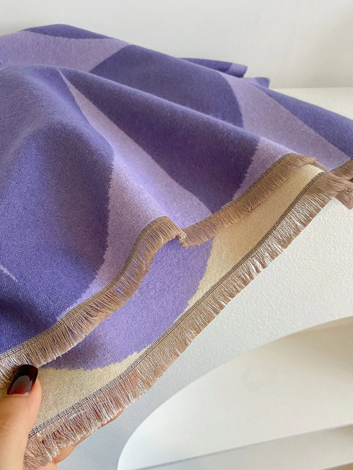 Cozy women's reversible cashmere scarf. A soft, warm accessory perfect for elegant winter fashion.