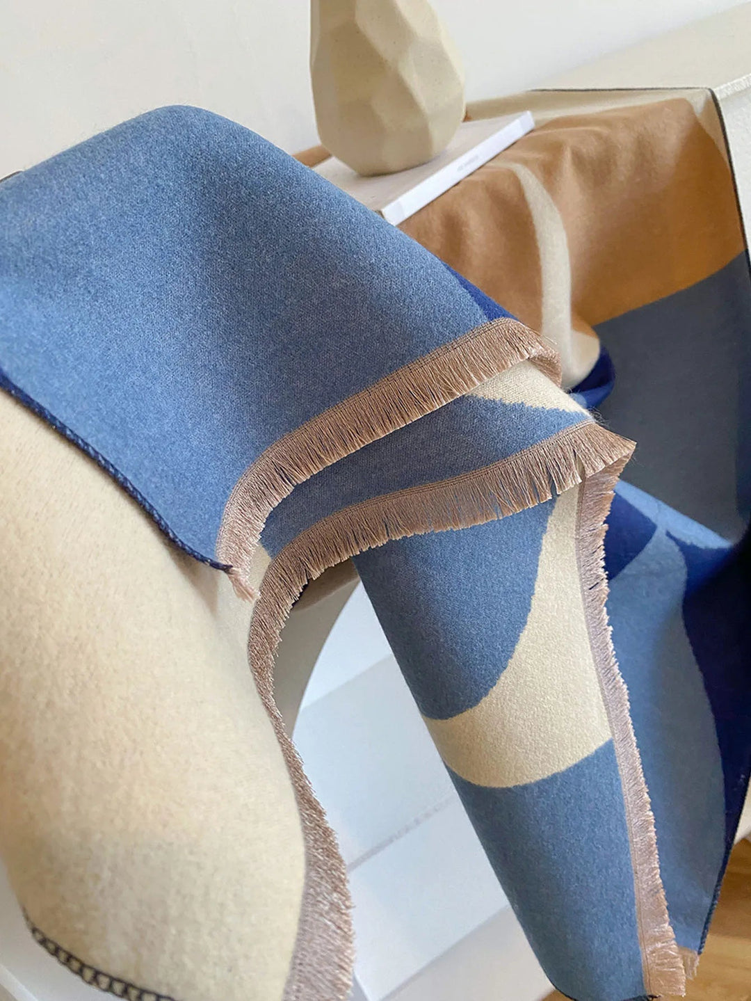 Luxurious reversible cashmere scarf for women. Elegant, warm, and soft winter accessory & gift.