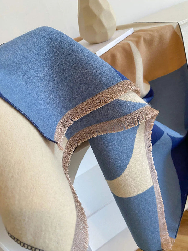 Luxurious reversible cashmere scarf for women. Elegant, warm, and soft winter accessory & gift.