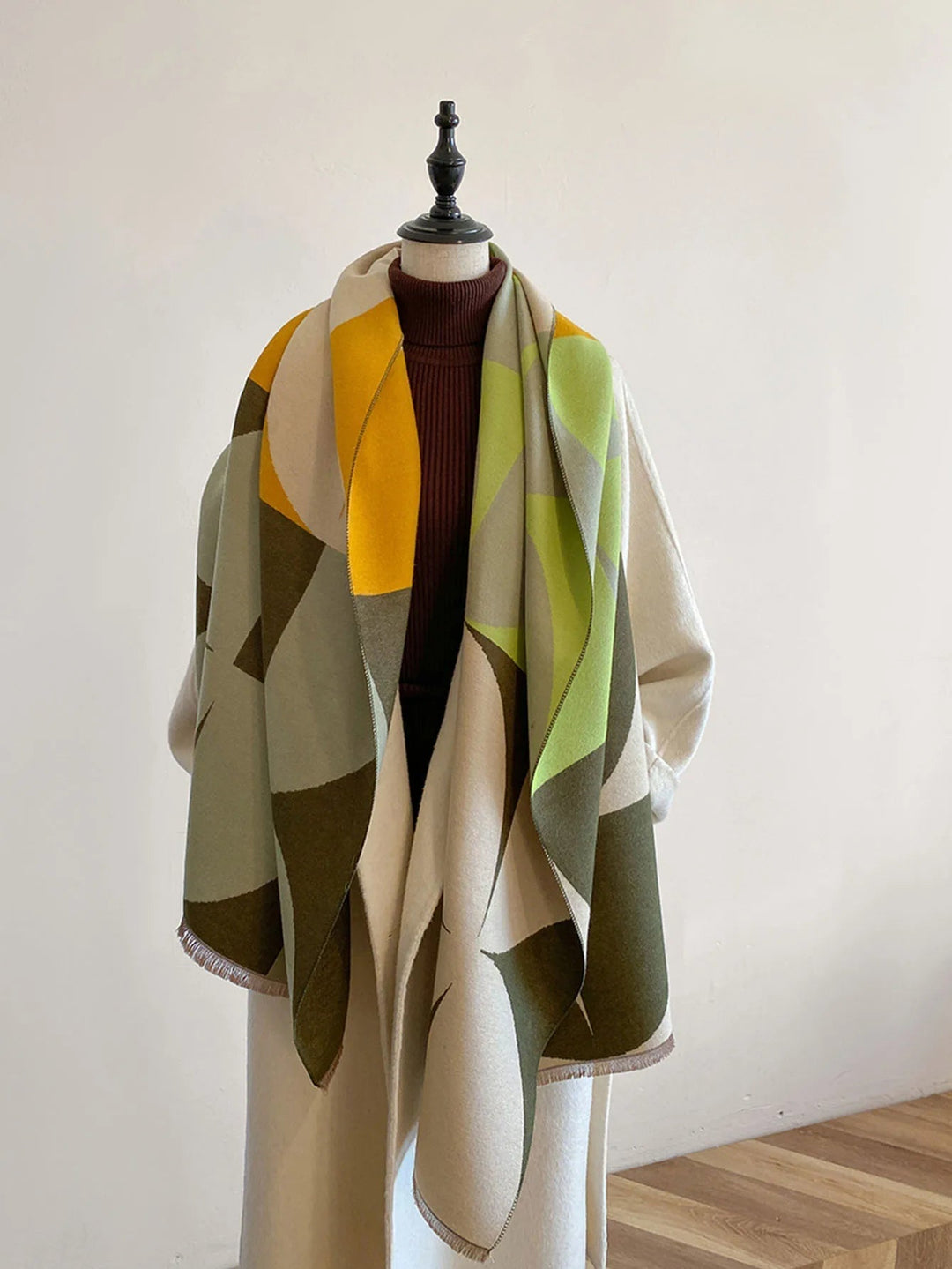 Elegant reversible cashmere scarf for women. Provides warmth & luxury for winter fashion.
