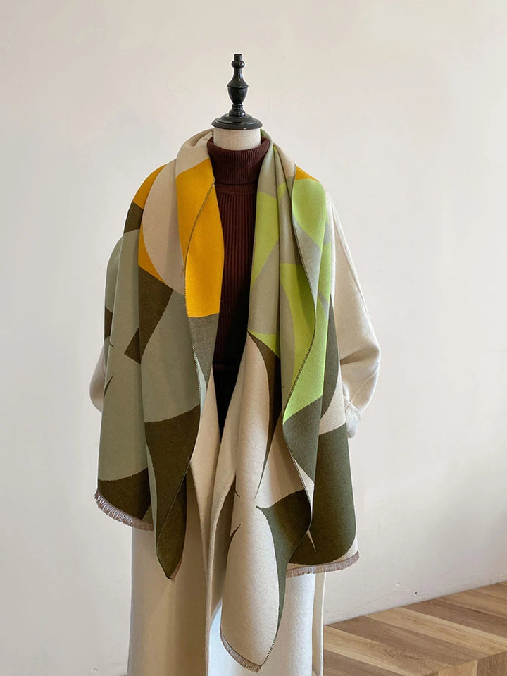 Elegant reversible cashmere scarf for women. Provides warmth & luxury for winter fashion.
