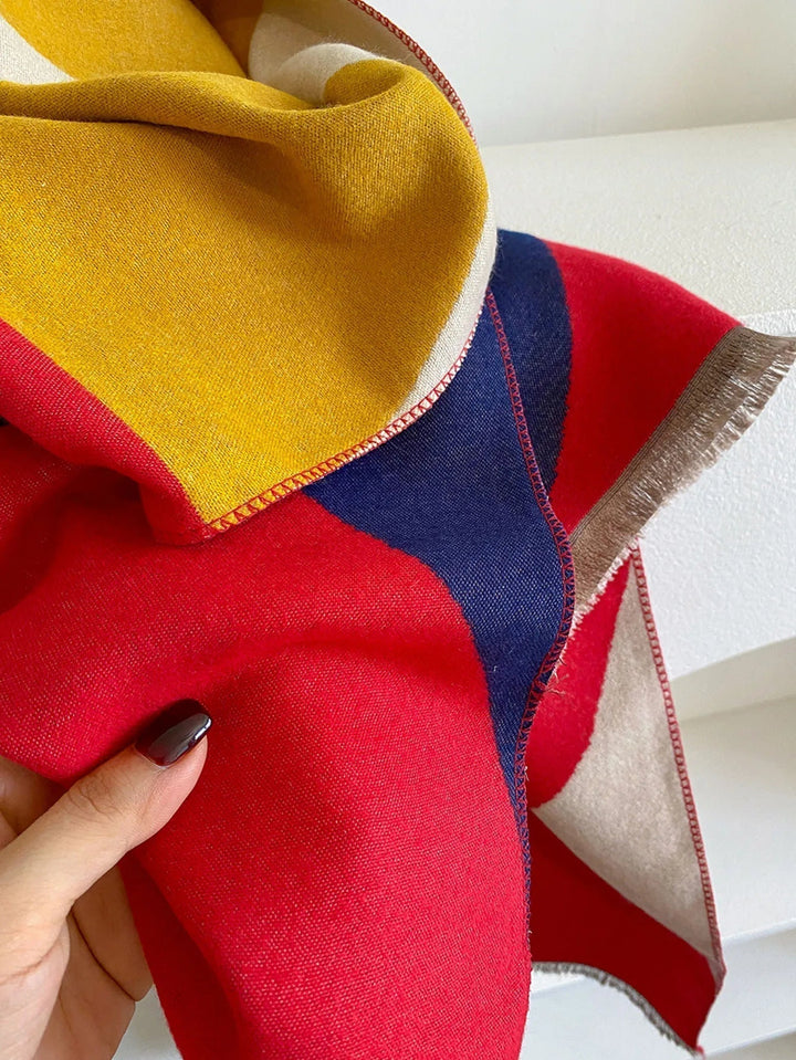 High-quality reversible cashmere scarf for women. Ensures elegant warmth & comfort in winter.