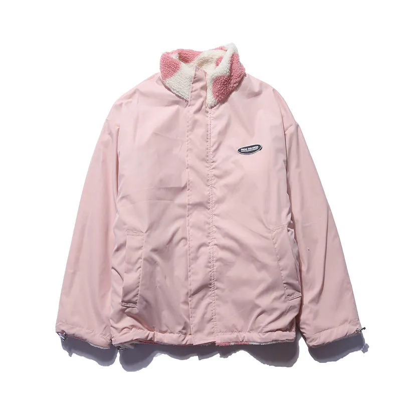 Women's long sleeve reversible jacket with a round neckline, featuring a subtle heart motif design