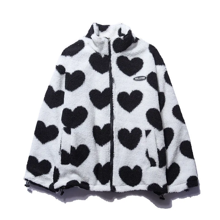Full shot of a reversible women's jacket with vivid heart patterns, highlighting its unique design and warmth