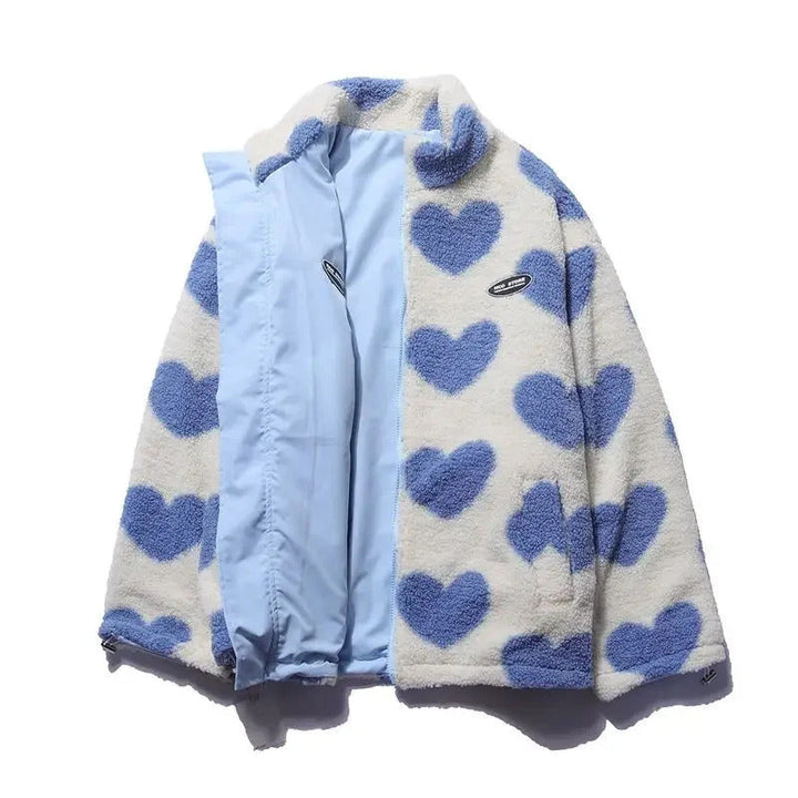 Detailed view of reversible zipper on women's heart quilted jacket, high quality outerwear