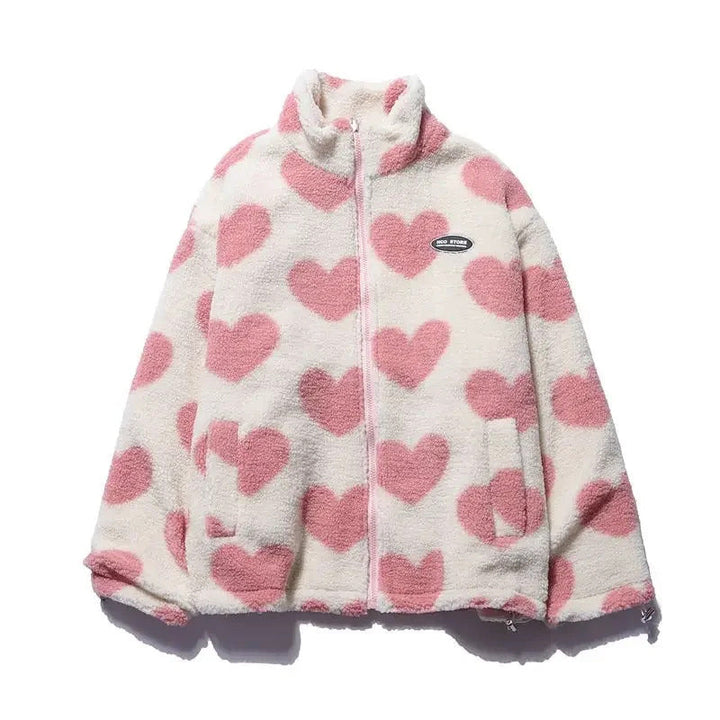 Front view of women's reversible heart quilted jacket, open, red lining visible, casual style