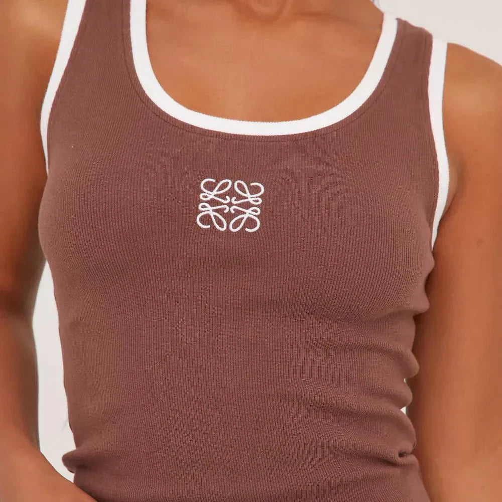 Daily style women's ripped tank top, delicate embroidery for a touch of casual elegance.