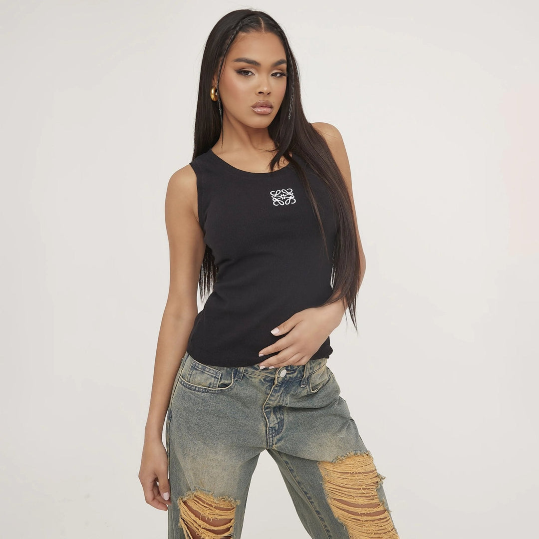 Trendy women's ripped tank top, delicate embroidery adds an elegant touch to casual summer wear.