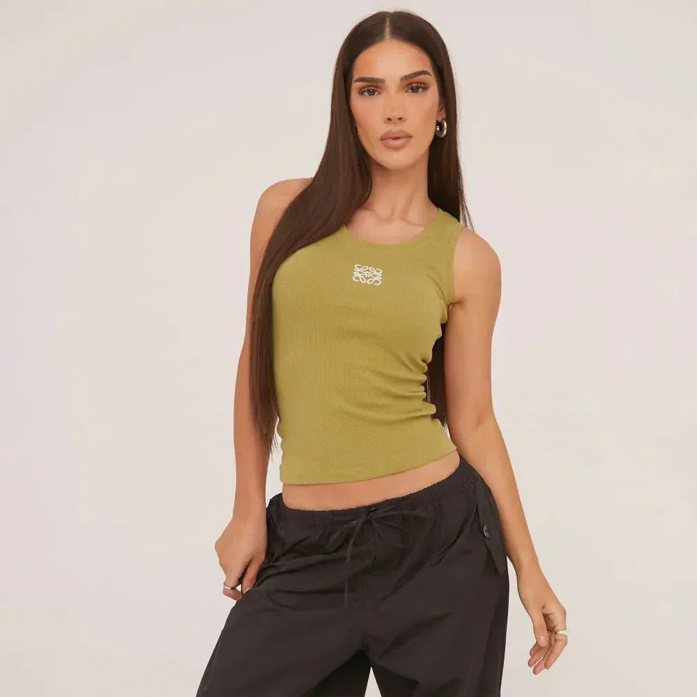 Ripped texture & delicate embroidery on a stylish women's tank top. Casual chic summer essential.