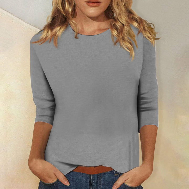 Classic women's solid tee, round neck, three-quarter sleeves. Perfect comfortable shirt for casual everyday style.