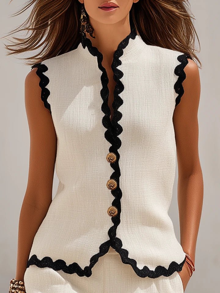 Women's scalloped linen blend two-piece shorts set. Perfect for warm weather and casual outings.