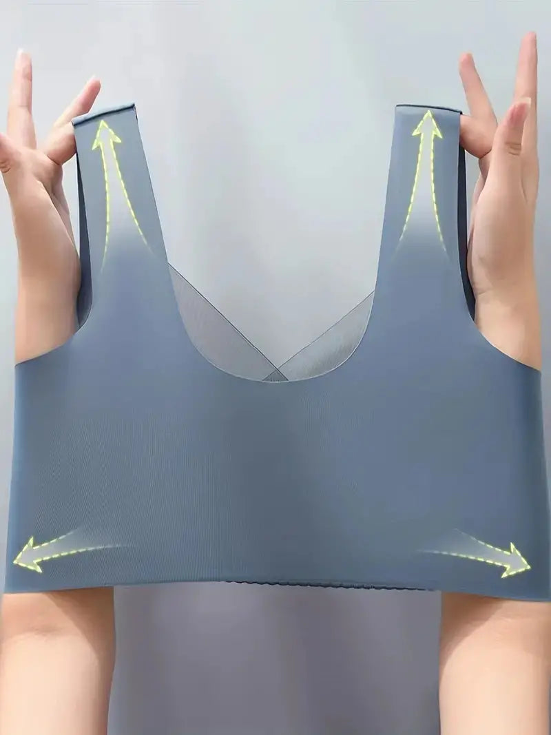 Model wearing a nude seamless comfort bra, perfect for activewear & daily support.