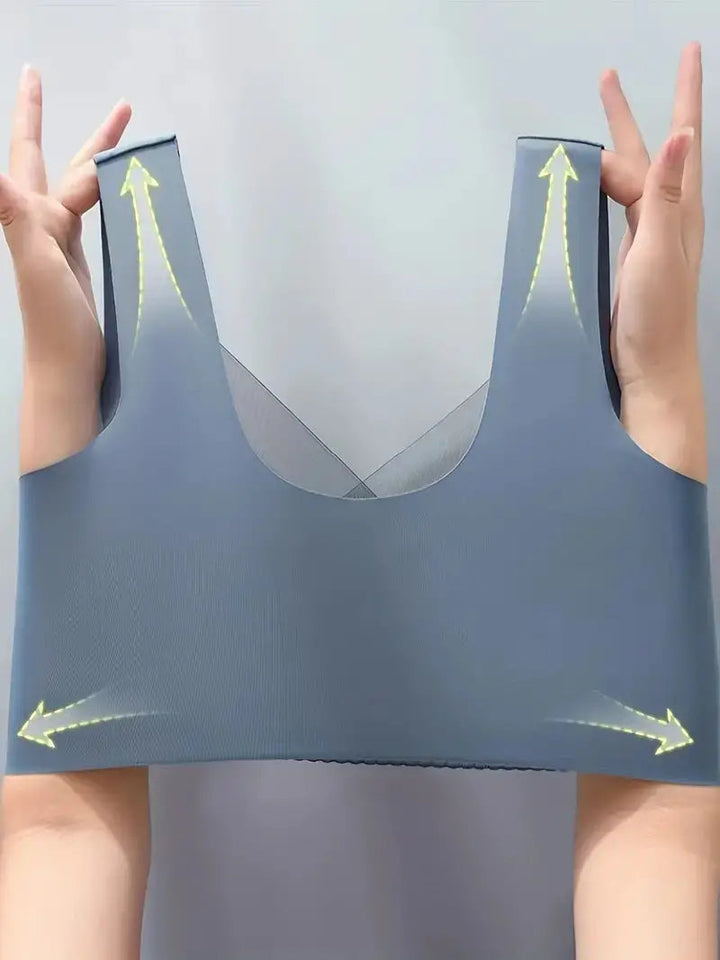 Model wearing a nude seamless comfort bra, perfect for activewear & daily support.