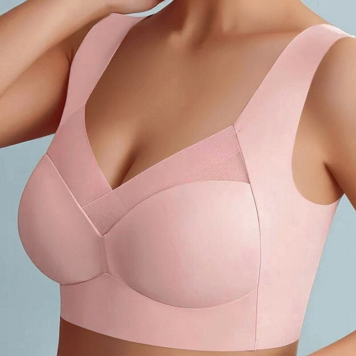 Women's everyday seamless comfort bra in black, providing essential support and smooth silhouette.