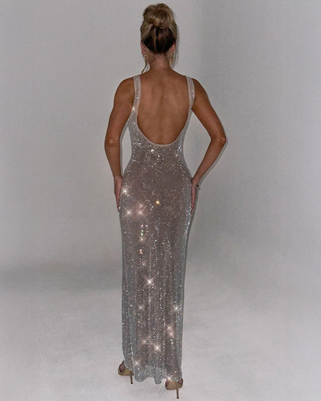 Beautiful women's long dress, embellished and shimmering for special occasions.