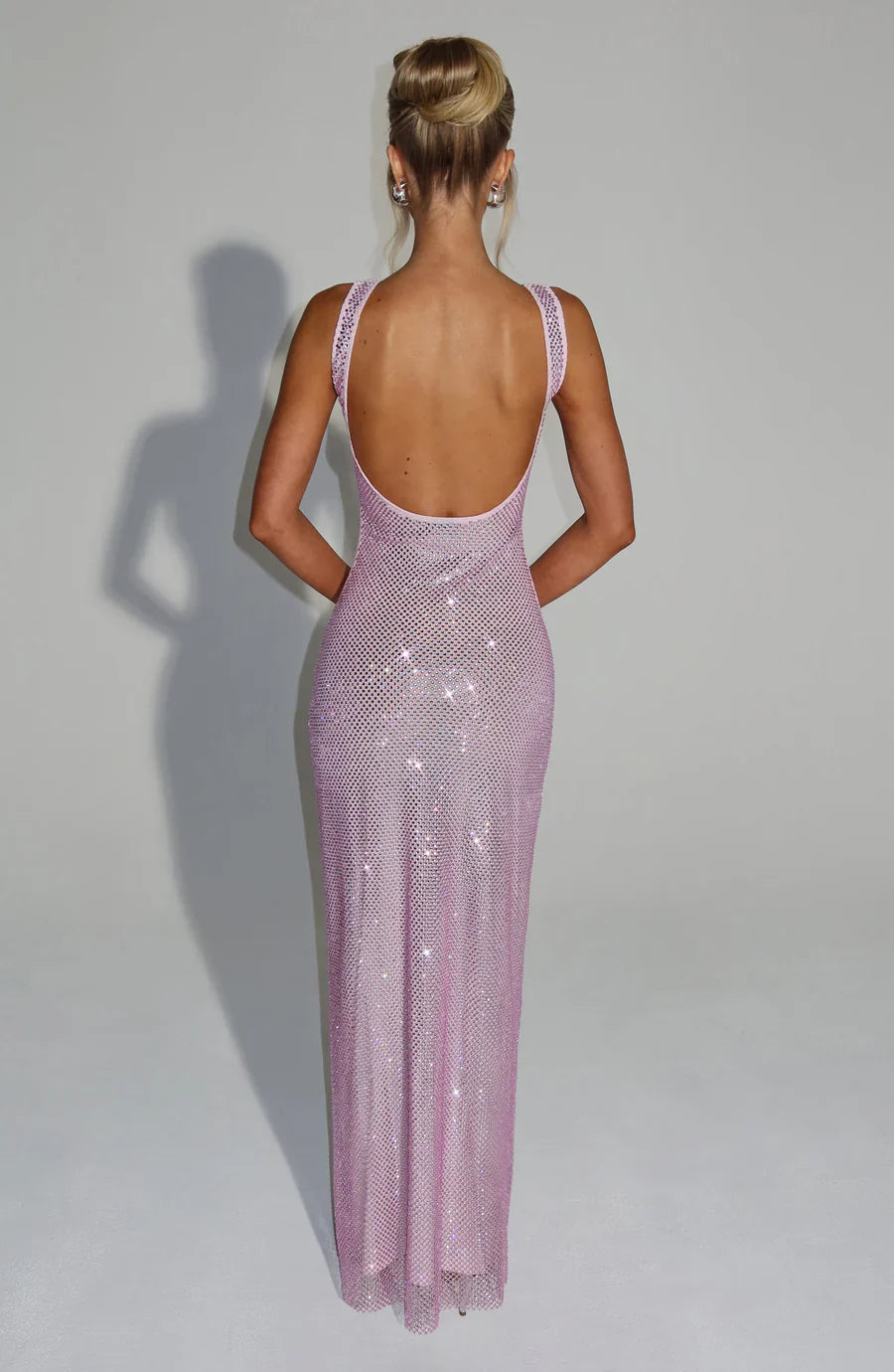Women's embellished glamour maxi dress, shimmering for a grand entrance.