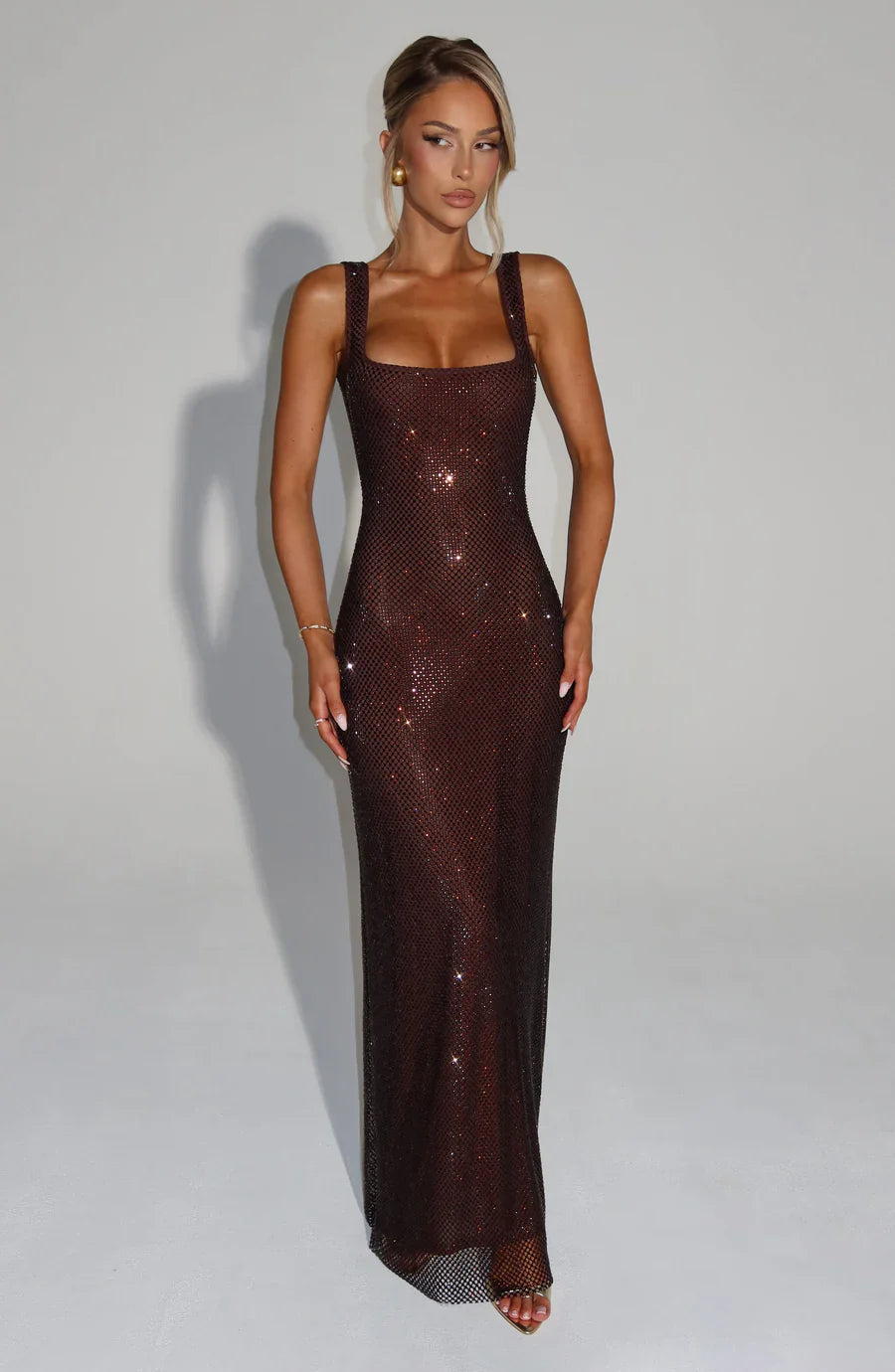 Shimmering long party dress for women, exquisitely embellished and formal.