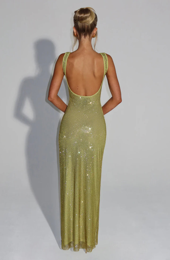 Dazzling women's formal gown: shimmering, long, and intricately embellished.