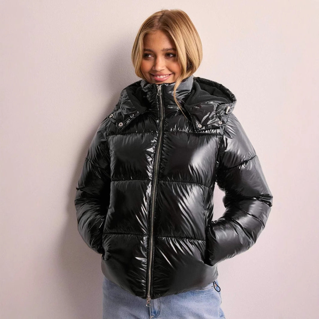 Stylish women's shiny quilted jacket, warm winter outerwear with a versatile removable hood.