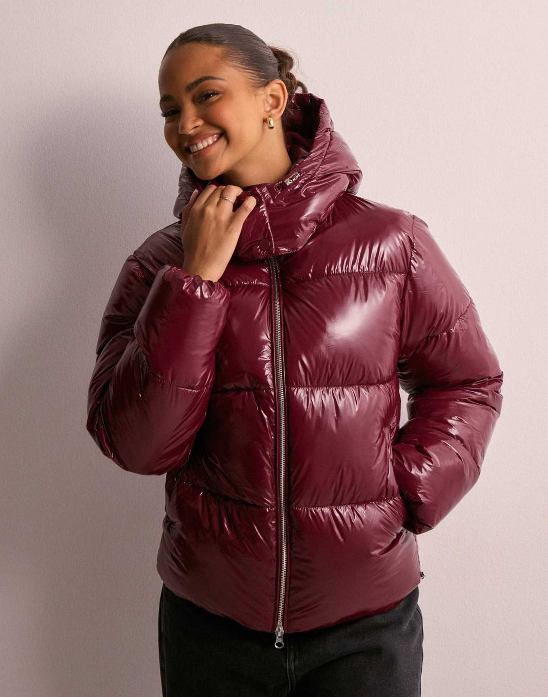 Chic women's shiny quilted jacket, a fashionable & warm winter coat with a practical removable hood.