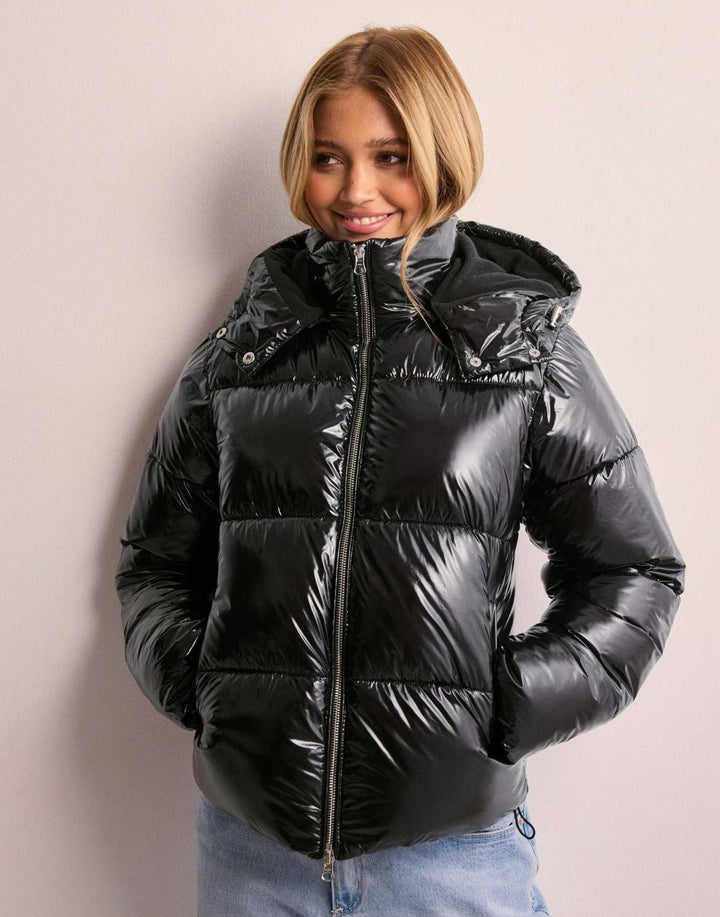 Shiny quilted women's jacket for winter, warm & stylish with a removable hood, perfect for cold days.