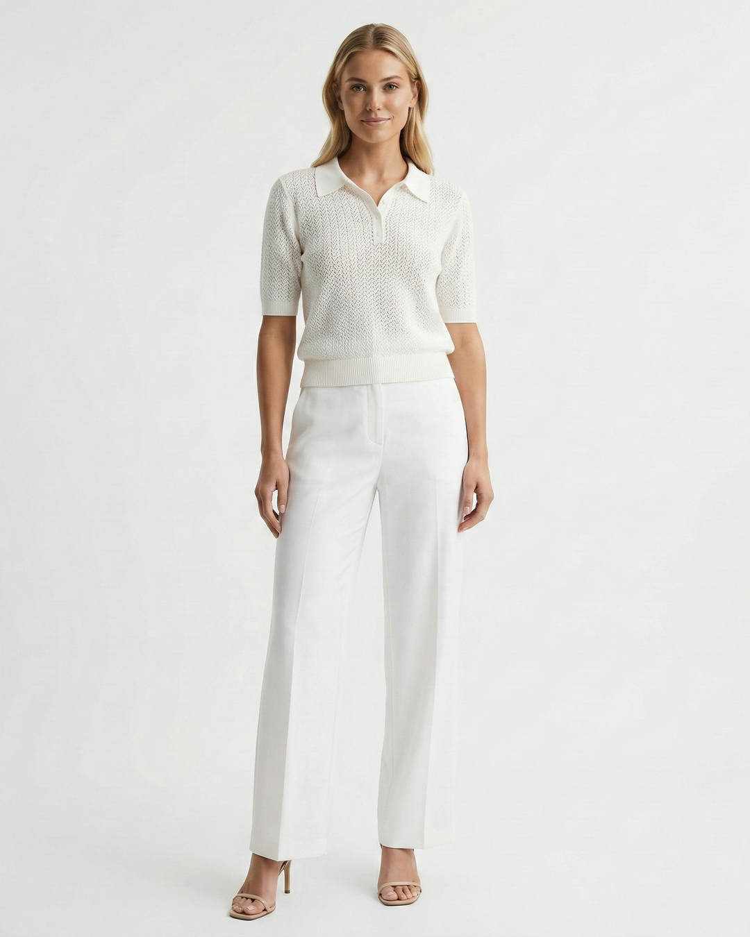 Chic women's knit polo shirt, short sleeve, relaxed fit. Ideal for smart casual summer wear.