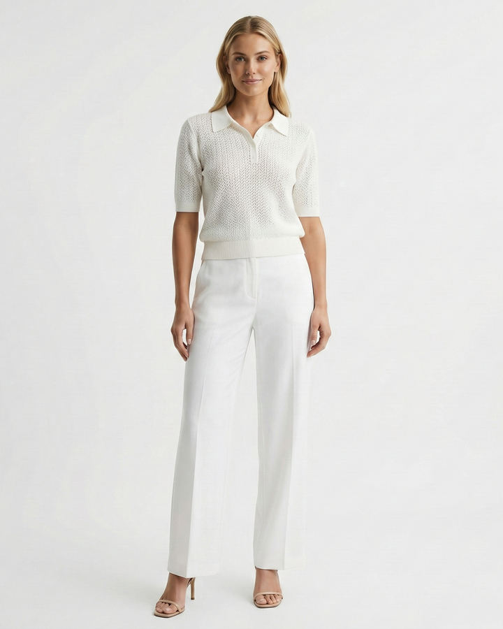 Chic women's knit polo shirt, short sleeve, relaxed fit. Ideal for smart casual summer wear.