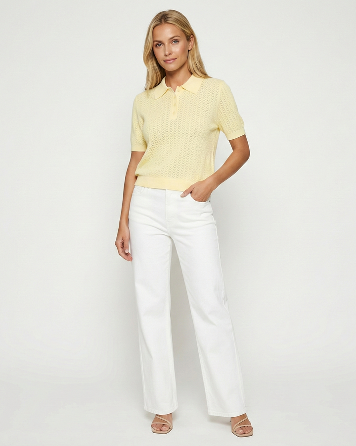 Versatile women's short sleeve knit polo top. Relaxed fit offers comfort for everyday & casual chic looks.