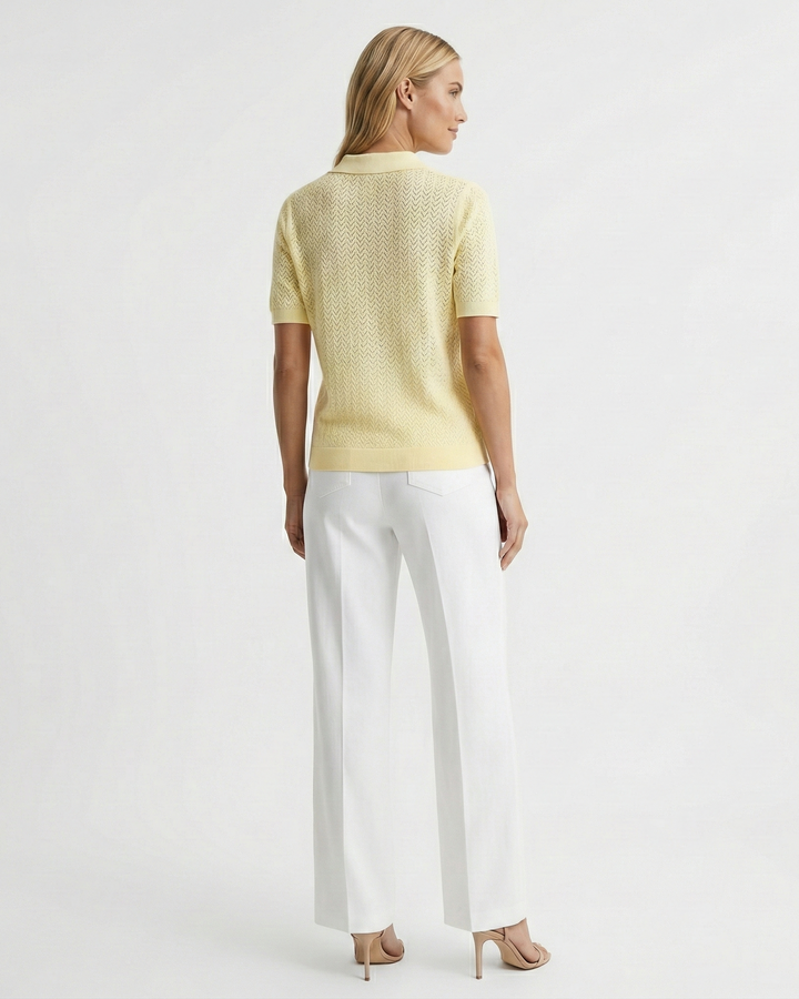 Women's short sleeve knit top featuring a stylish polo collar & relaxed fit. Perfect for summer casual.