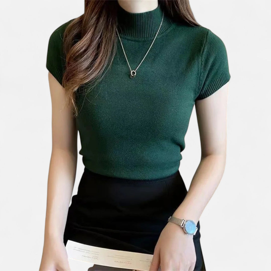 Women's short-sleeve turtleneck blouse, an elegant and chic top perfect for sophisticated everyday style.