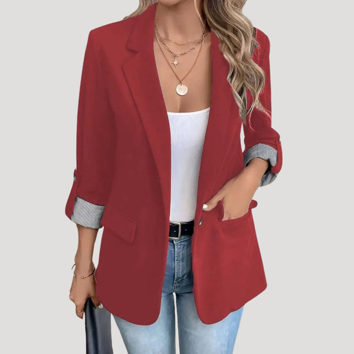 Cream single-breasted blazer for women, designed with roll-up sleeves, ideal for fashion outerwear