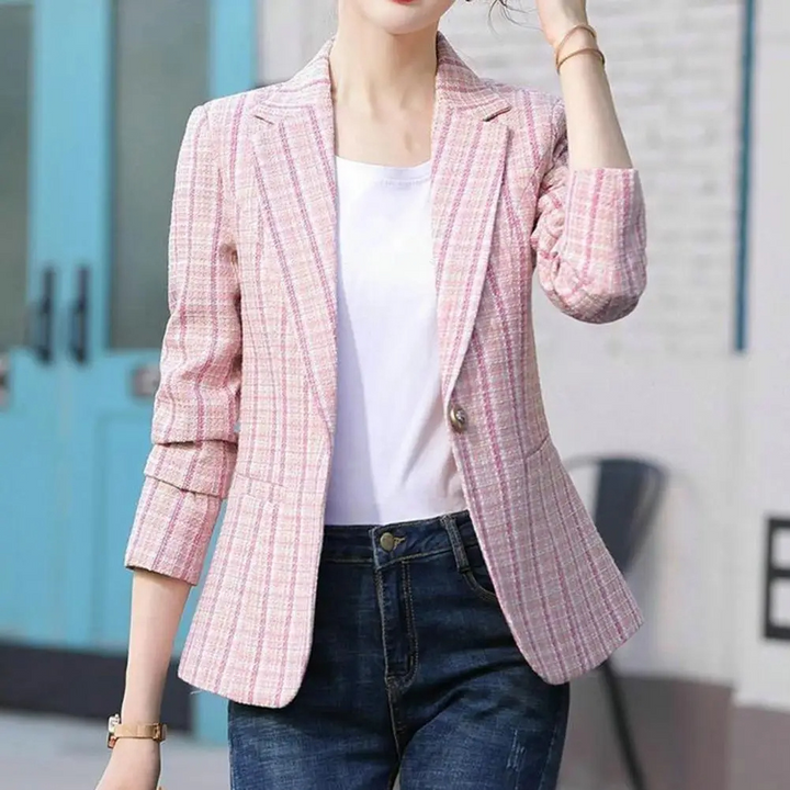 Stylish pink single-button tailored blazer for women, offering a chic and professional look for work.