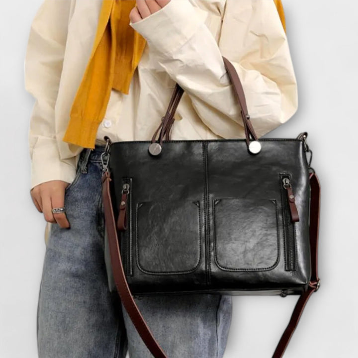 Stylish olive green women's shoulder bag, a versatile everyday accessory with ample storage.