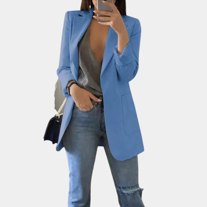 Stylish women's longline tailored blazer, showcasing a flattering slim fit & modern design for office or casual chic.