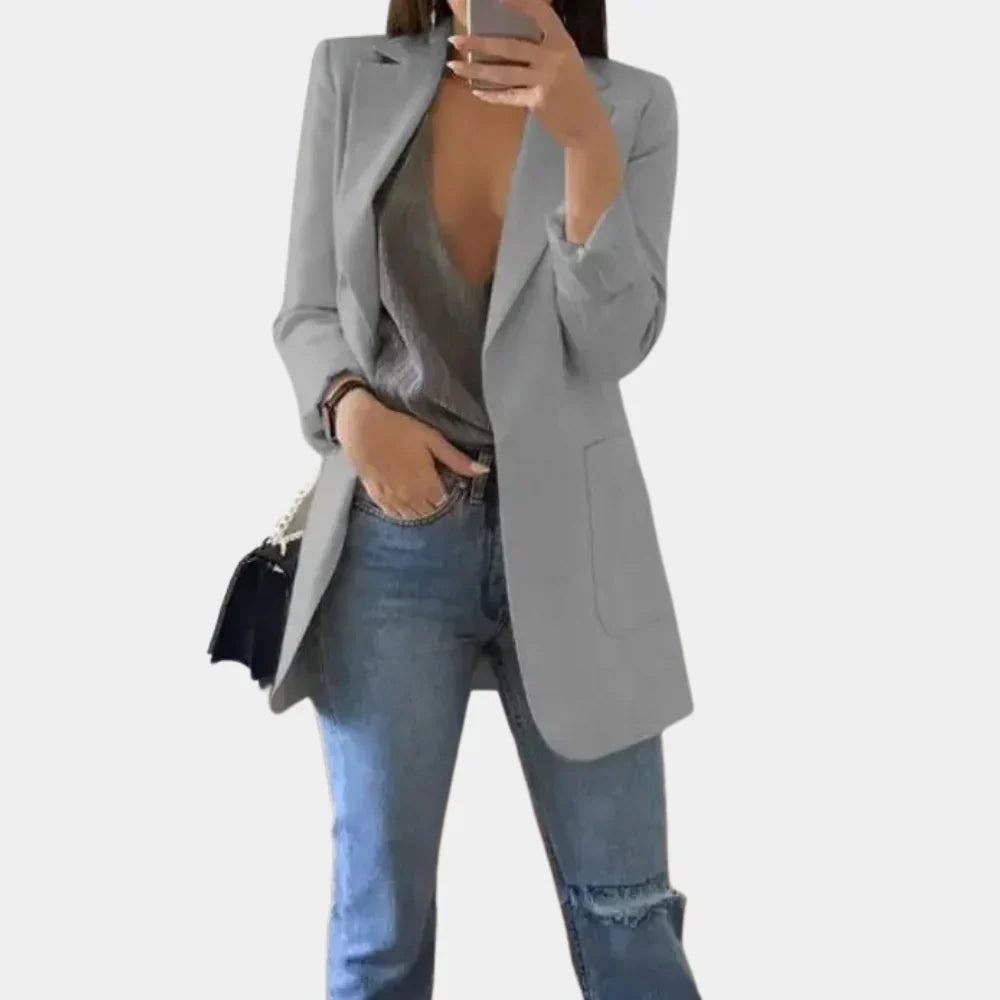 Back view of women's slim fit longline tailored blazer, highlighting its elegant cut & professional versatile style.