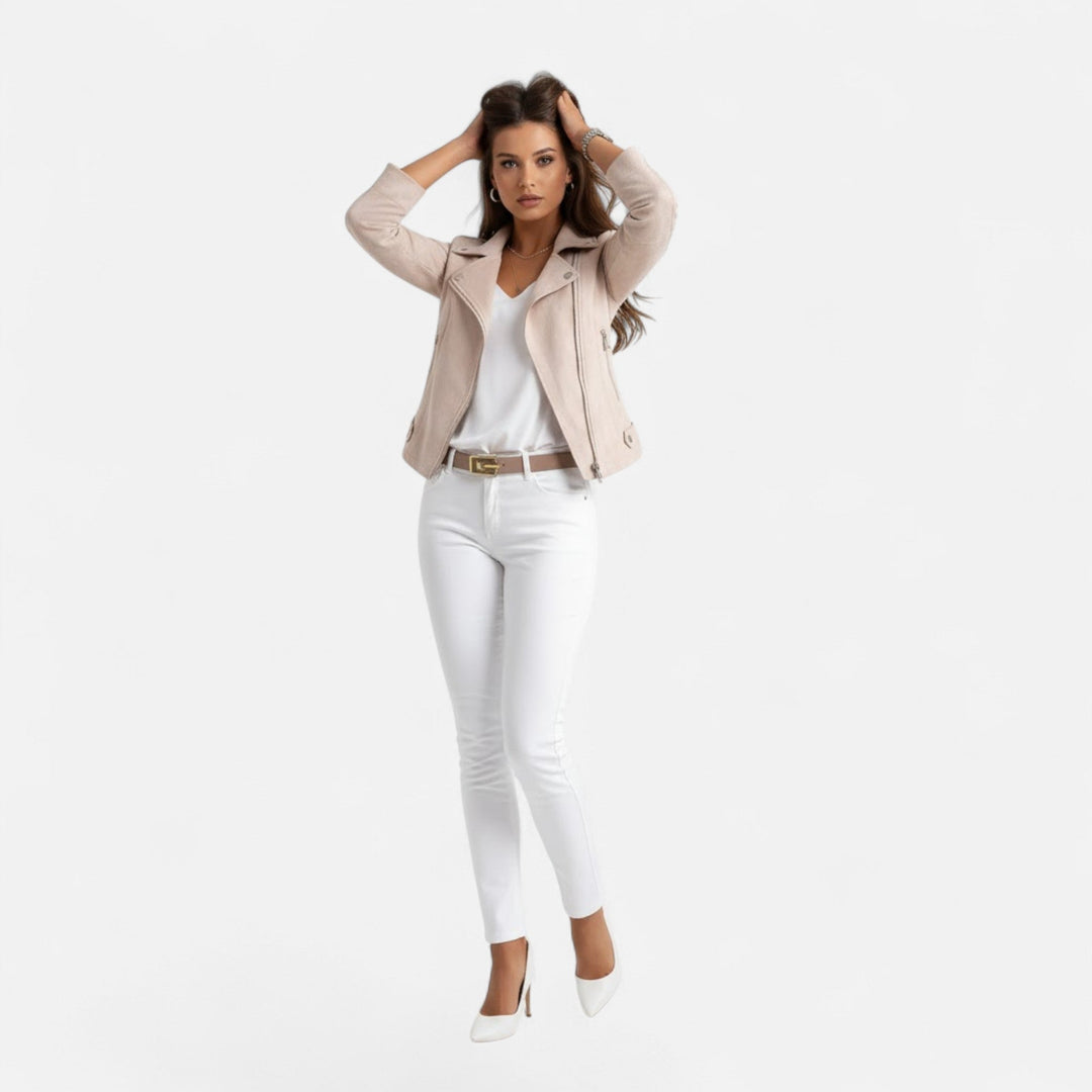 Effortless women's jacket featuring a stylish zip closure, slim lapels, & convenient pockets.