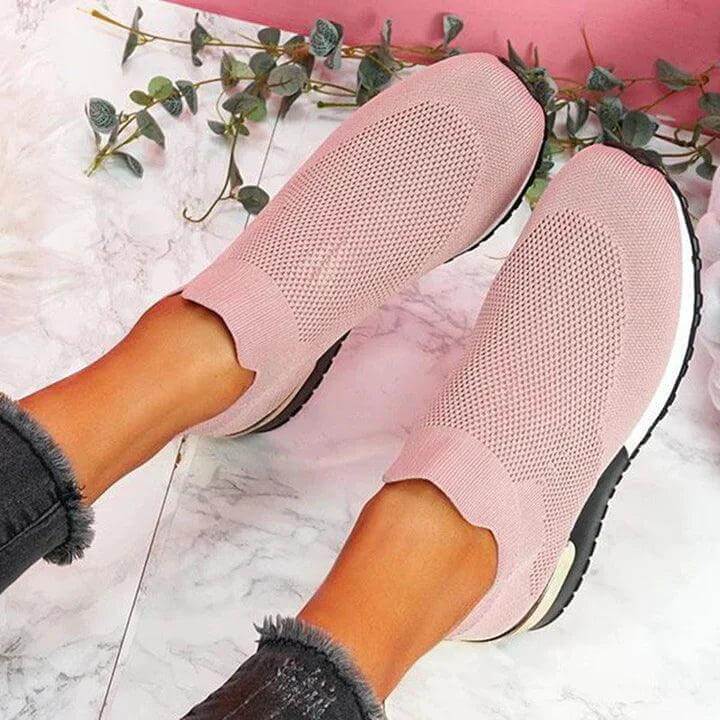Stylish women's orthopedic slip-on sneakers in a neutral color, offering superb comfort & arch support.