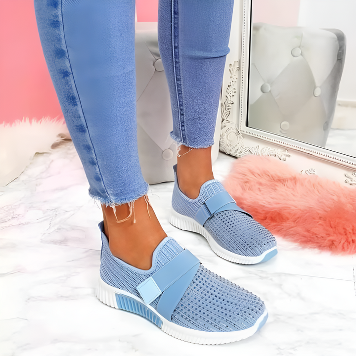 Women's slip-on trainers with elastic strap. Lightweight comfort sneakers perfect for walking & everyday wear.