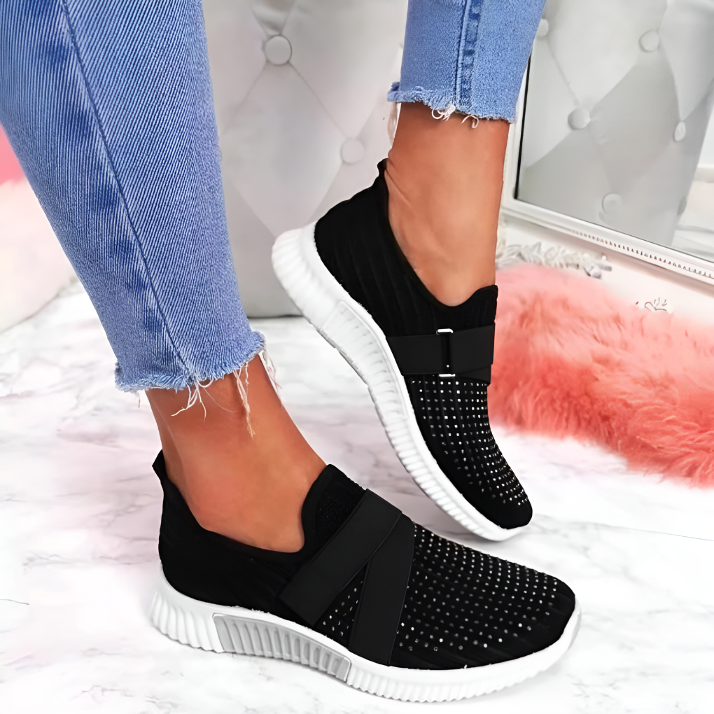 Casual women's slip-on trainers. Breathable, lightweight design with elastic strap for all-day comfort.
