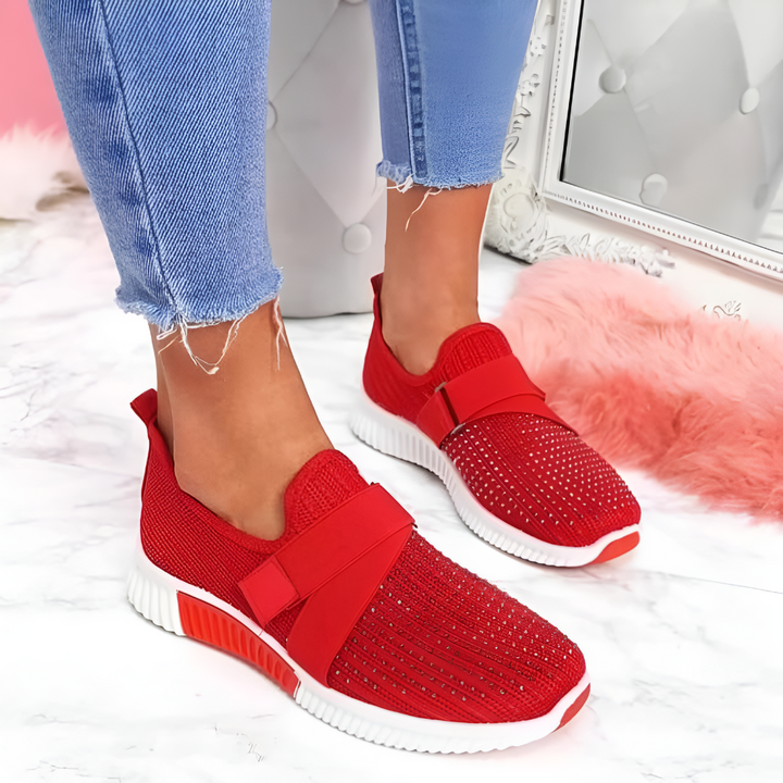 Women's athletic casual slip-on shoes. Lightweight, breathable comfort with elastic strap for active days.