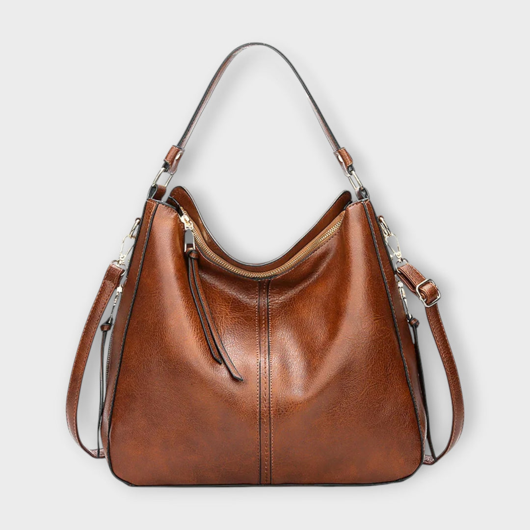 Women's slouchy hobo crossbody bag in black faux leather, stylish and versatile everyday shoulder bag