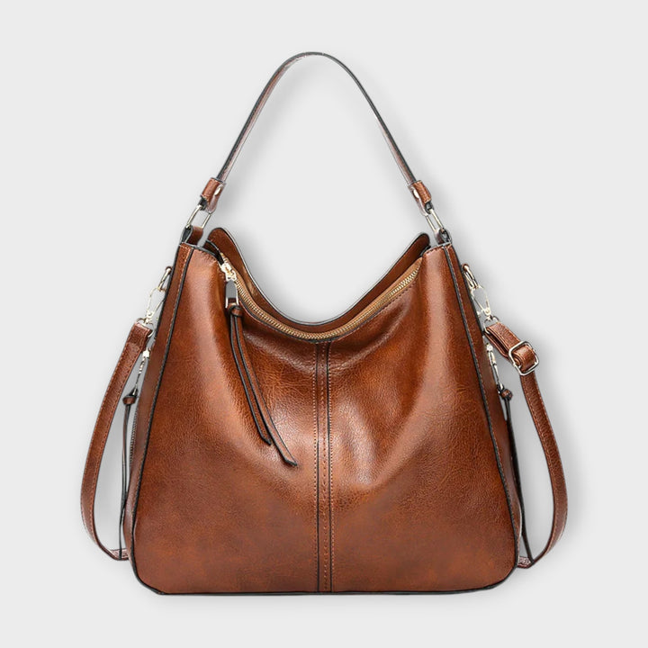 Women's slouchy hobo crossbody bag in black faux leather, stylish and versatile everyday shoulder bag
