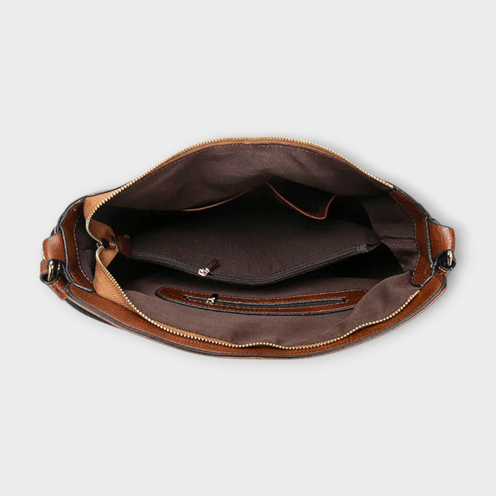 Slouchy faux leather hobo crossbody bag with ample storage, a chic and practical women's accessory